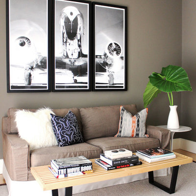 Living room - large contemporary formal and enclosed carpeted living room idea in New York with gray walls, a standard fireplace, a stone fireplace and no tv