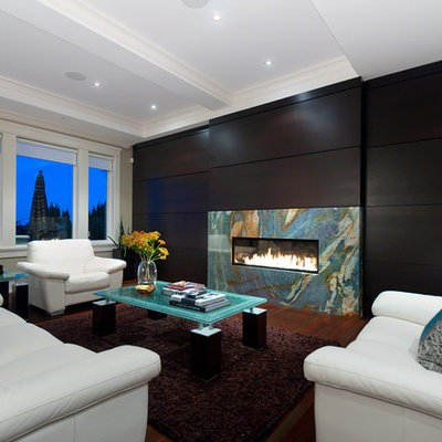 Inspiration for a large contemporary open concept dark wood floor living room remodel in Vancouver with a ribbon fireplace, a stone fireplace and no tv