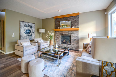 Example of a transitional living room design in Edmonton