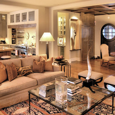 Example of a classic open concept living room design in Chicago with beige walls