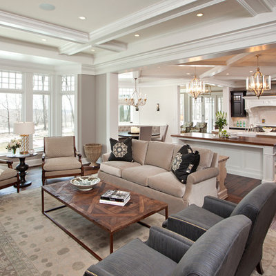Example of a classic open concept brown floor and coffered ceiling living room design in Minneapolis with gray walls