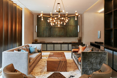 Design ideas for a contemporary formal enclosed living room in London with beige walls, carpet and a concealed tv.