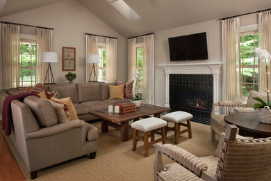 Example of a farmhouse living room design in Detroit
