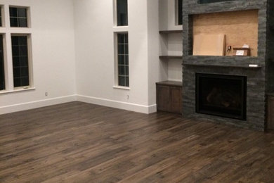 Large minimalist medium tone wood floor living room photo in Sacramento