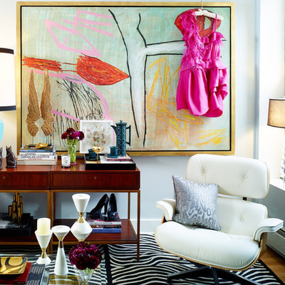 Inspiration for an eclectic living room remodel in New York with blue walls