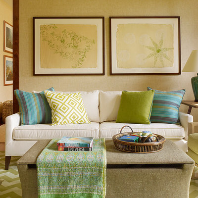 Inspiration for a mid-sized tropical enclosed medium tone wood floor living room remodel in Hawaii with beige walls