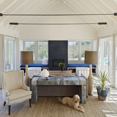 Living room - country open concept living room idea in San Francisco with white walls and no tv