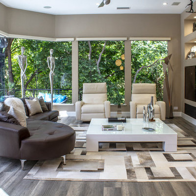 Living room - large contemporary formal and open concept dark wood floor living room idea in Dallas with gray walls, no fireplace and a wall-mounted tv