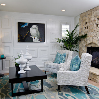 Example of a trendy formal living room design in Orange County with a standard fireplace, a stone fireplace and no tv