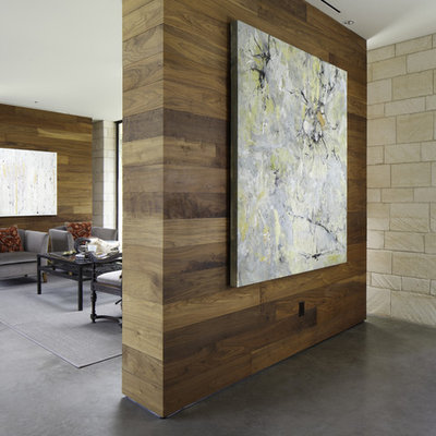Example of a trendy concrete floor living room design in Austin