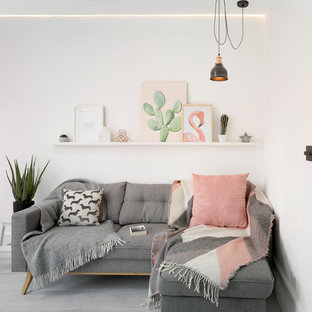Scandi living room in London with white walls and grey floors.