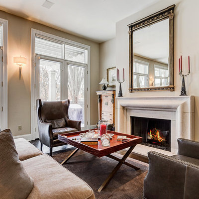 Living room - traditional formal dark wood floor living room idea in Columbus with beige walls and a standard fireplace