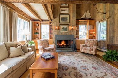 Example of a cottage living room design in Boston