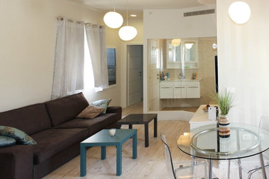 Living room - coastal living room idea in Tel Aviv