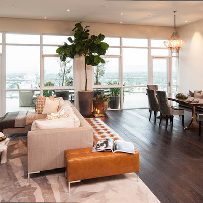 Example of a trendy open concept living room design in Los Angeles with white walls