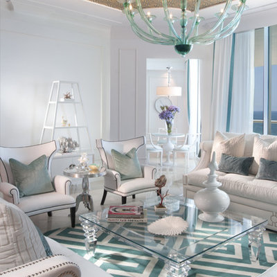 Trendy living room photo in Miami with white walls