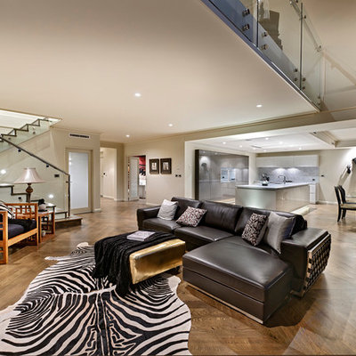 Living room - contemporary formal and open concept medium tone wood floor living room idea in Perth with white walls