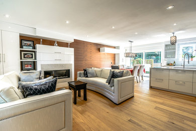 Living room - modern light wood floor living room idea in Toronto