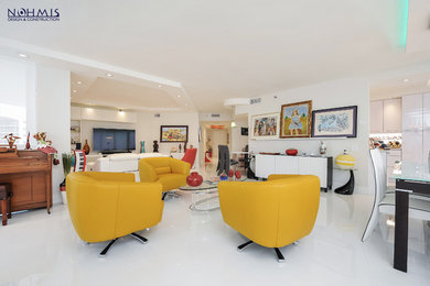 Example of a mid-sized minimalist formal and open concept marble floor living room design in Miami with white walls, no fireplace and a tv stand
