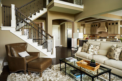 Example of a large trendy open concept dark wood floor living room design in Other with gray walls, a standard fireplace, a stone fireplace and a wall-mounted tv