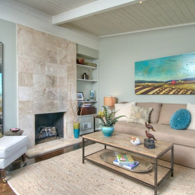Trendy living room photo in San Francisco with blue walls and a standard fireplace