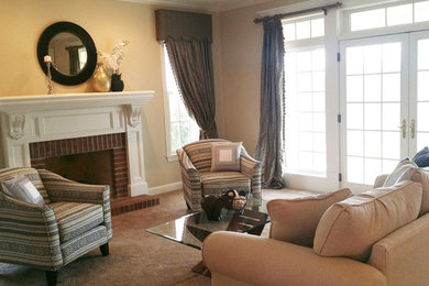 Transitional carpeted living room photo in Kansas City with red walls, a standard fireplace and a wood fireplace surround