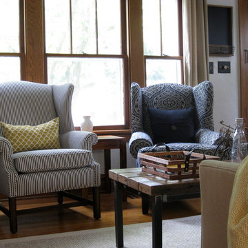 Homeowner's vintage wing backs were refinished in a pair of indigo fabrics.