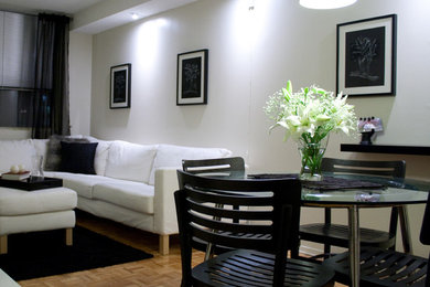 Ejemplo de salón tipo loft minimalista pequeño con paredes blancas