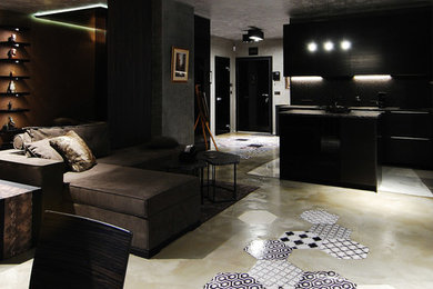 Diseño de salón para visitas abierto moderno de tamaño medio con paredes multicolor y suelo de cemento