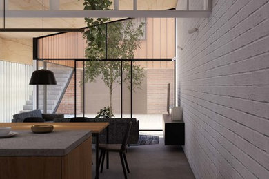Idee per un soggiorno industriale di medie dimensioni e aperto con pavimento in cemento