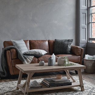 Scandi living room in London with grey walls, dark hardwood flooring and no fireplace.