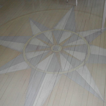 Housefox Design - Compass Rose. Milk Paint on wood floor.
