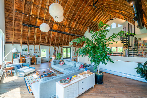 Farmhouse Living Room by Franklin & Associates - Design/Build
