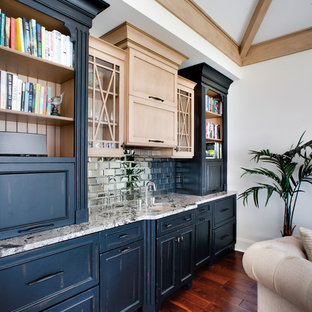 Large eclectic formal and open concept carpeted living room photo in Other with white walls, a wood stove, a wood fireplace surround and a wall-mounted tv