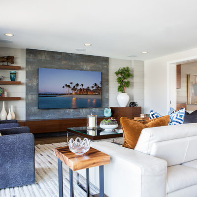 Living room - mid-sized contemporary open concept medium tone wood floor and brown floor living room idea in Orange County with gray walls, no fireplace and a media wall