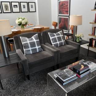 Trendy living room library photo in Chicago with white walls