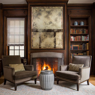 Living room - traditional formal medium tone wood floor and brown floor living room idea in Chicago with brown walls and a standard fireplace
