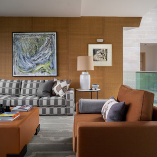 This is an example of a large contemporary formal mezzanine living room in Other with brown walls.
