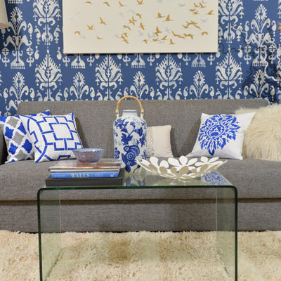 Inspiration for a modern living room remodel in New York with blue walls