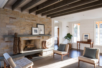 Inspiration for a farmhouse formal and open concept dark wood floor living room remodel in New York with a standard fireplace, a stone fireplace and no tv