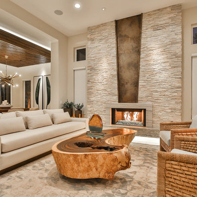 Inspiration for a mid-sized contemporary formal and open concept beige floor and travertine floor living room remodel in Other with beige walls, a ribbon fireplace, a stone fireplace and no tv