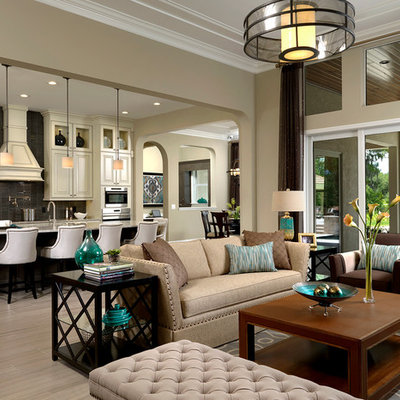 Inspiration for a transitional formal and open concept living room remodel in Orlando with beige walls