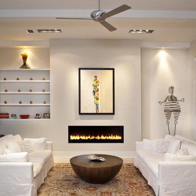 Living room - contemporary living room idea in Tampa with beige walls and a ribbon fireplace