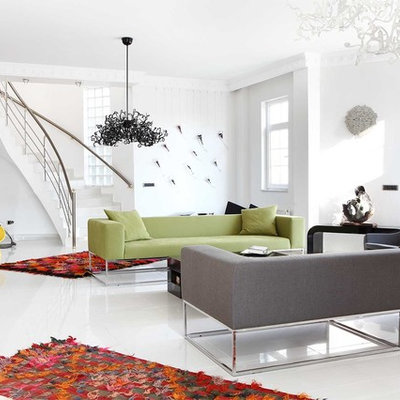 Living room - contemporary living room idea in Other with white walls
