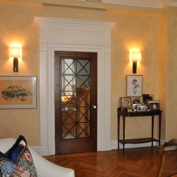 Interior pediment and door, artisan plaster on walls - living room