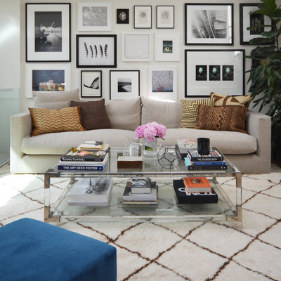 Living room - contemporary formal living room idea in London with white walls