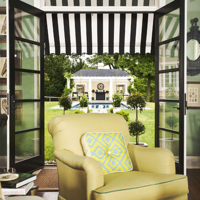 Inspiration for a timeless living room remodel in Baltimore with green walls
