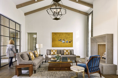 Transitional dark wood floor, brown floor, exposed beam and vaulted ceiling living room photo in Austin with white walls