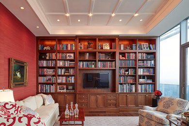 Diseño de salón cerrado clásico renovado de tamaño medio sin televisor con paredes rojas, suelo de madera oscura y suelo marrón