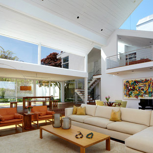 Design ideas for an expansive modern open plan living room in New York with a music area and white walls.